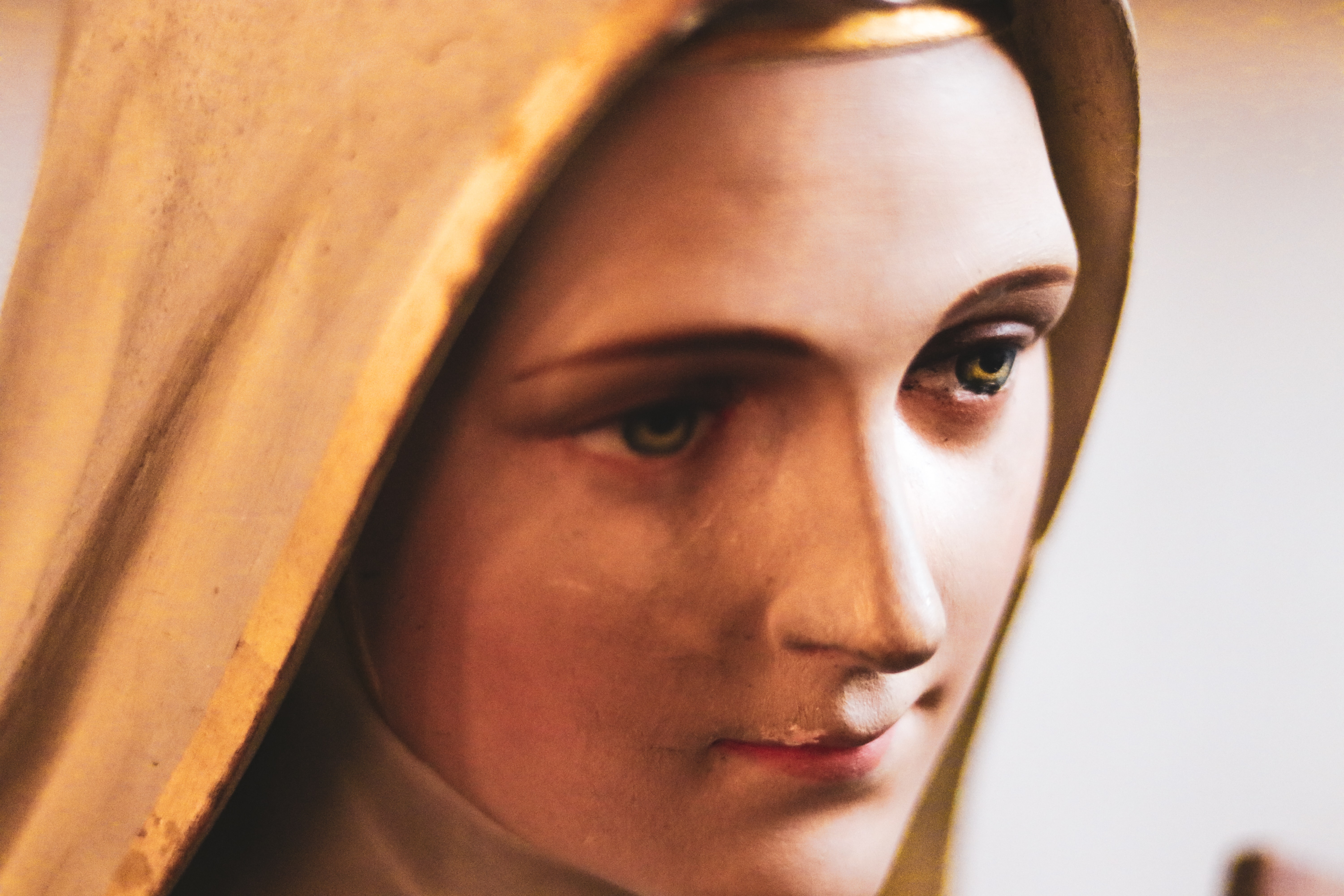 Close up of the face of statue of Mary